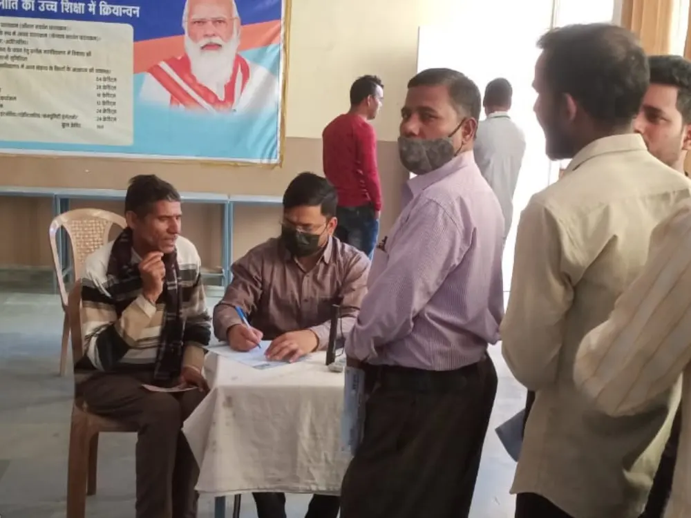 Doctor consulting patients at free eye camp